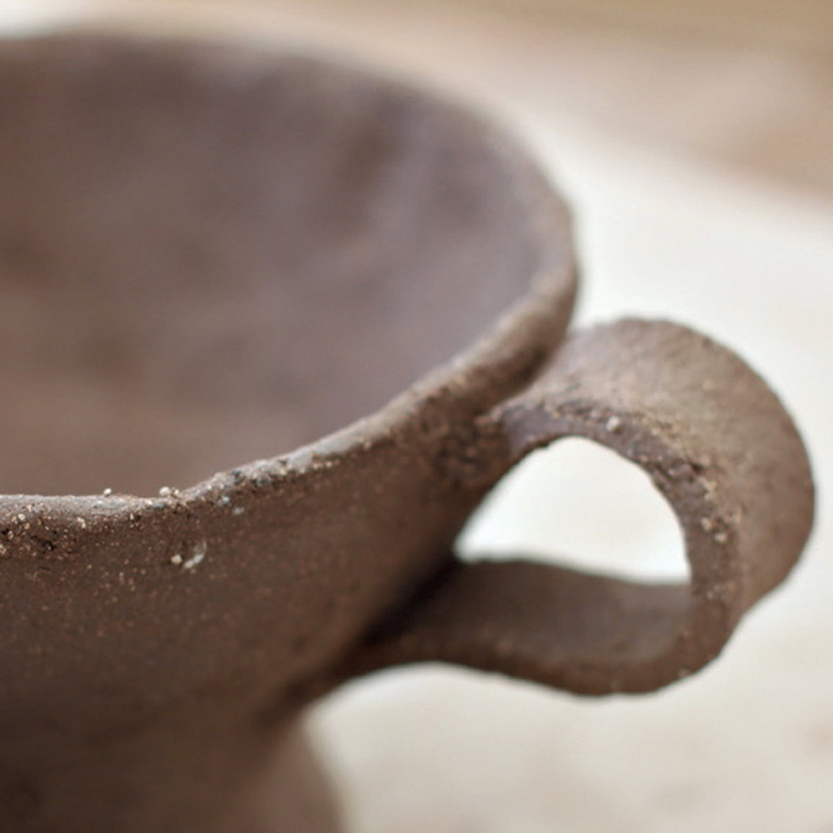 hand crafted pottery inspired by the beach, using actual sand