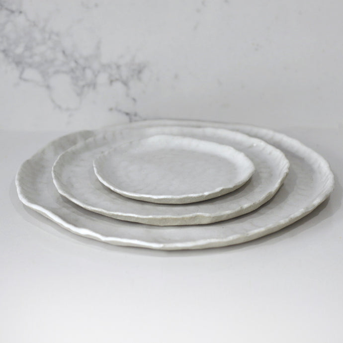 Palmy by Day. One dining plate set